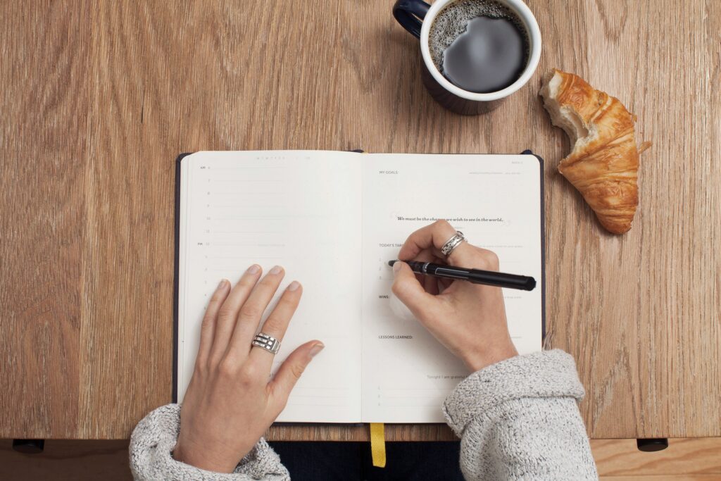 writer revising notebook
